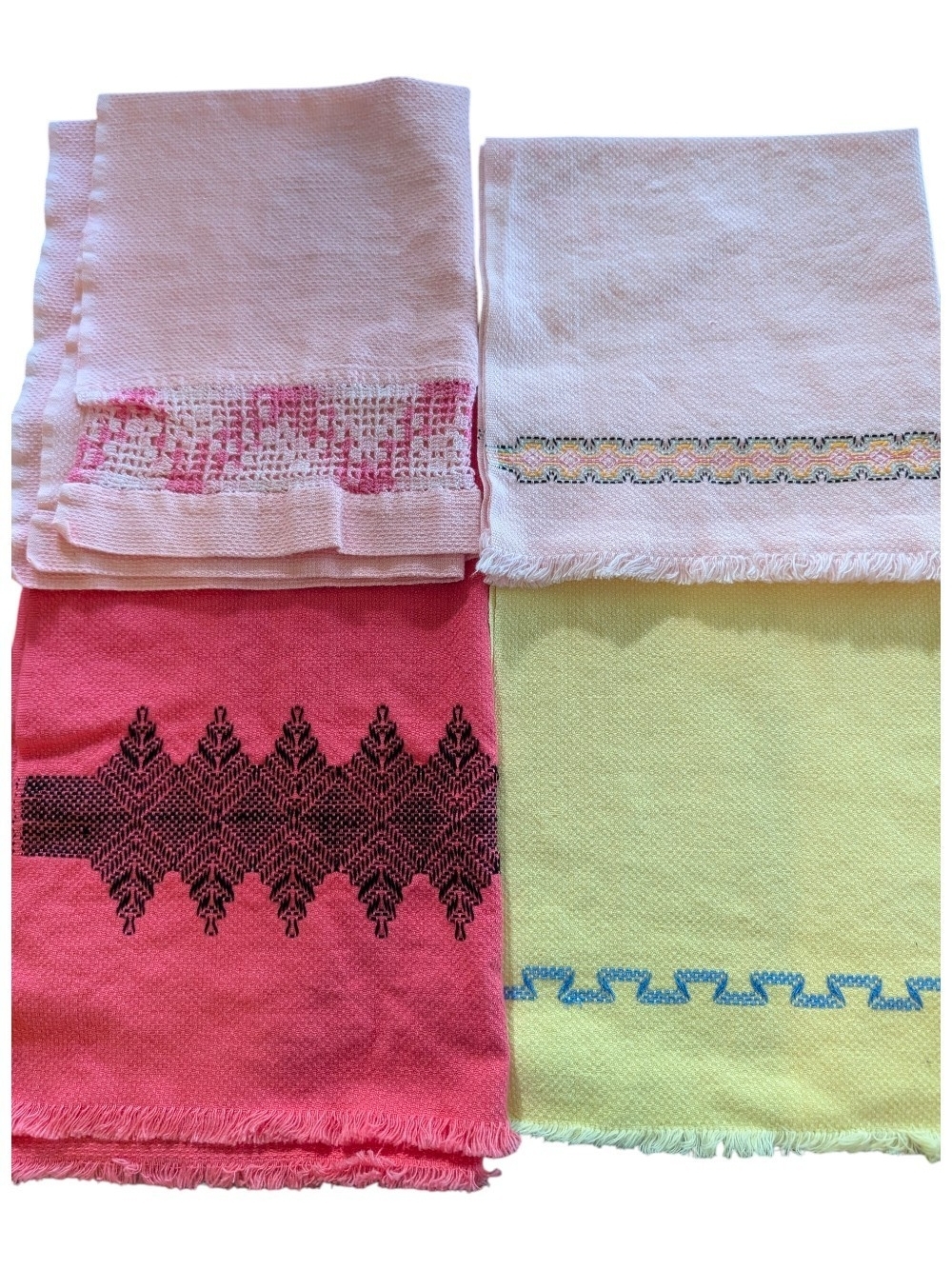 Set of four vintage huck embroidery towels